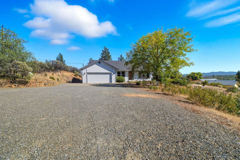 Photo of 11361 Tanstaafl Lane, Redding, CA 96001 (MLS # 25-4483)