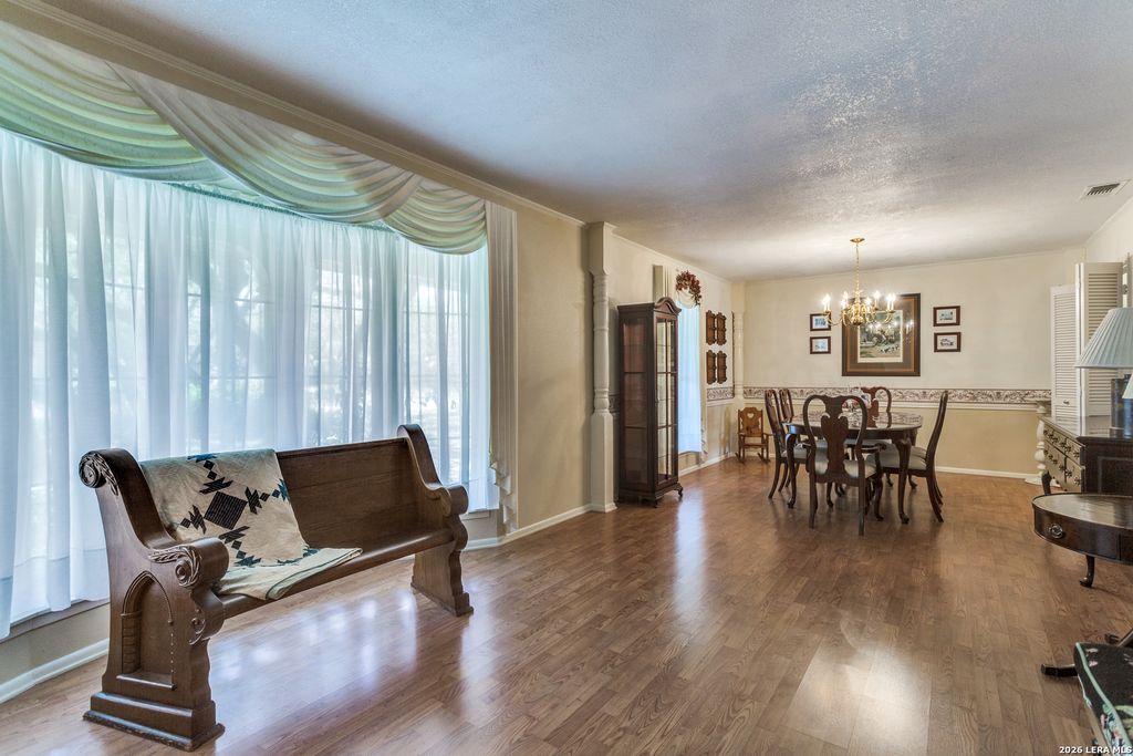 Photo of 11303 WHISPERING WIND ST, San Antonio, TX 78230 (MLS # 1956210)