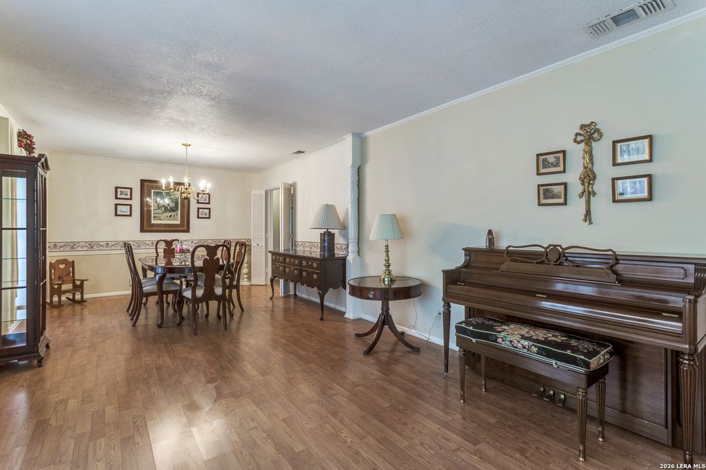 Photo of 11303 WHISPERING WIND ST, San Antonio, TX 78230 (MLS # 1956210)