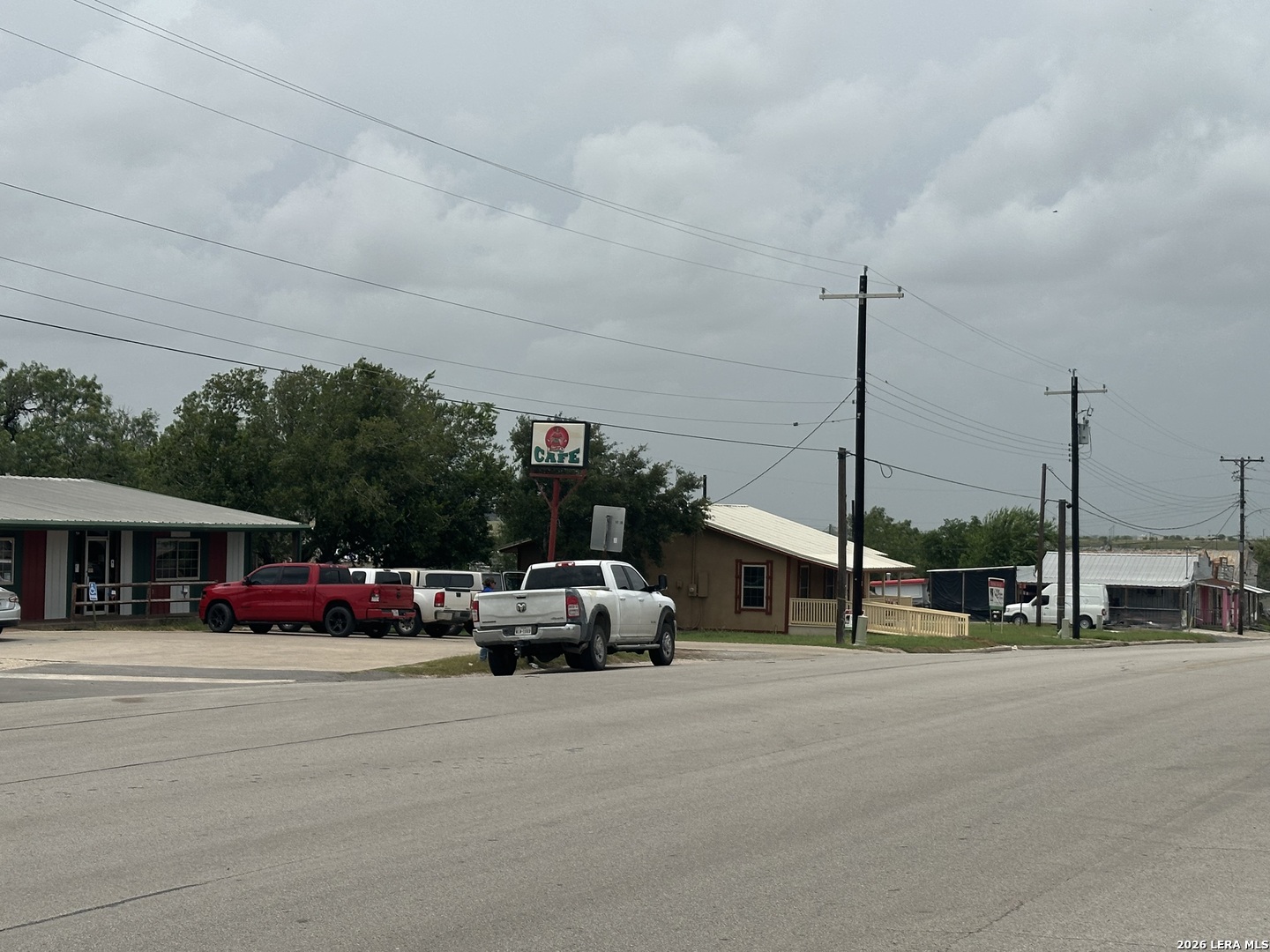 Photo 1 of 11 — 201 W CALVERT AVE, Karnes City, TX 78118