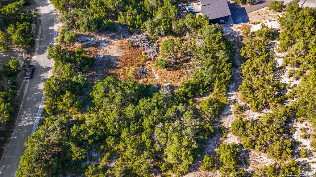 Photo of 813 Valley Rdg, Canyon Lake, TX 78133 (MLS # 1915519)