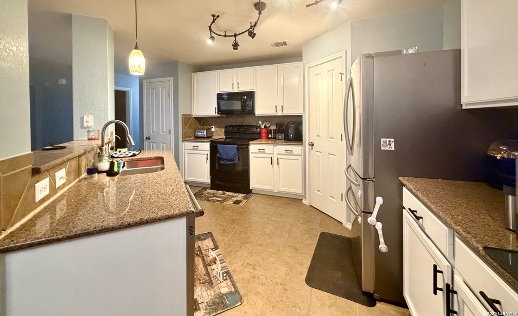 Photo of 324 SADDLEHORN WAY, Cibolo, TX 78108 (MLS # 1969089)