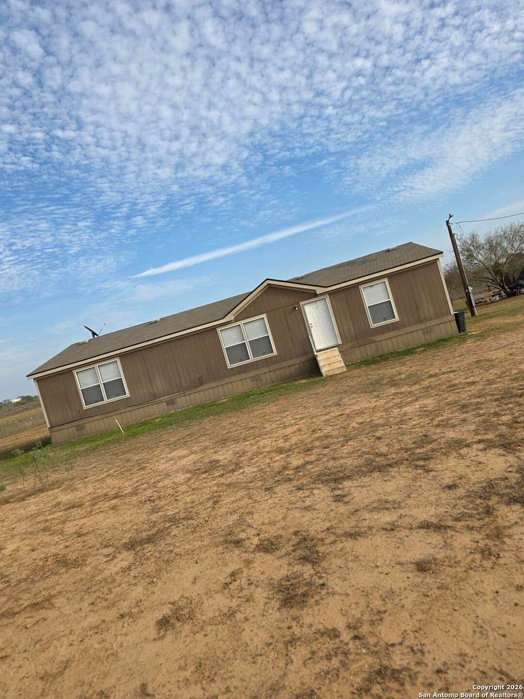 Photo of 132 S Price, Poteet, TX 78065 (MLS # 1931885)