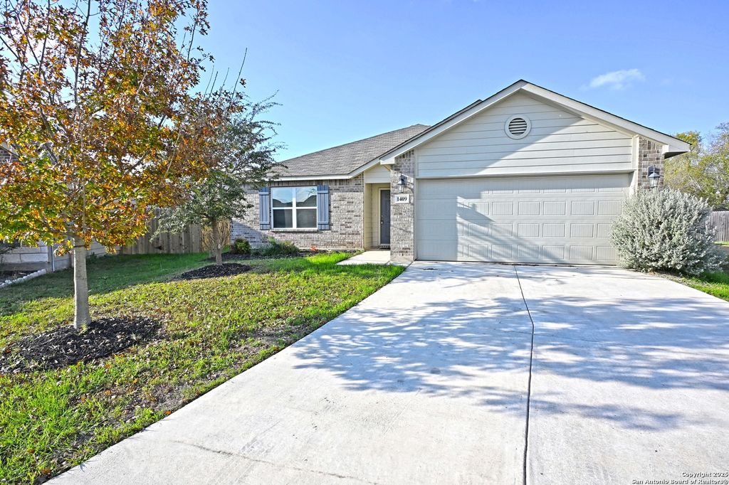 Photo of 1409 COFFEE TREE DR, New Braunfels, TX 78130 (MLS # 1929960)