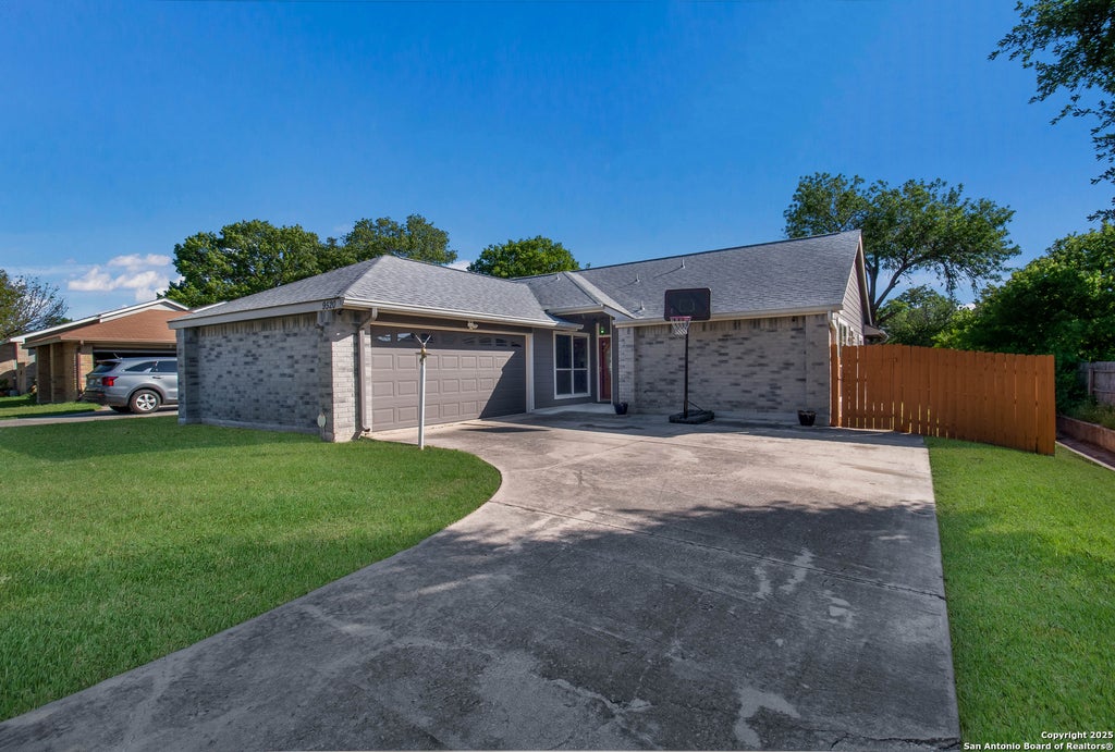 Photo of 9520 Woodland Hills, San Antonio, TX 78250 (MLS # 1857384)