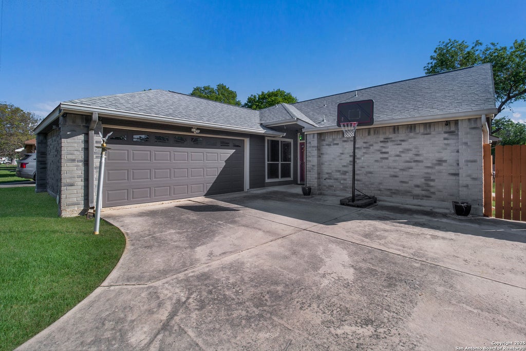 Photo of 9520 Woodland Hills, San Antonio, TX 78250 (MLS # 1857384)