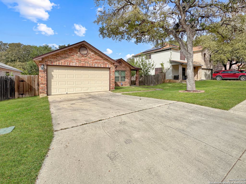 Photo of 6883 Crested Quail, San Antonio, TX 78250 (MLS # 1915330)