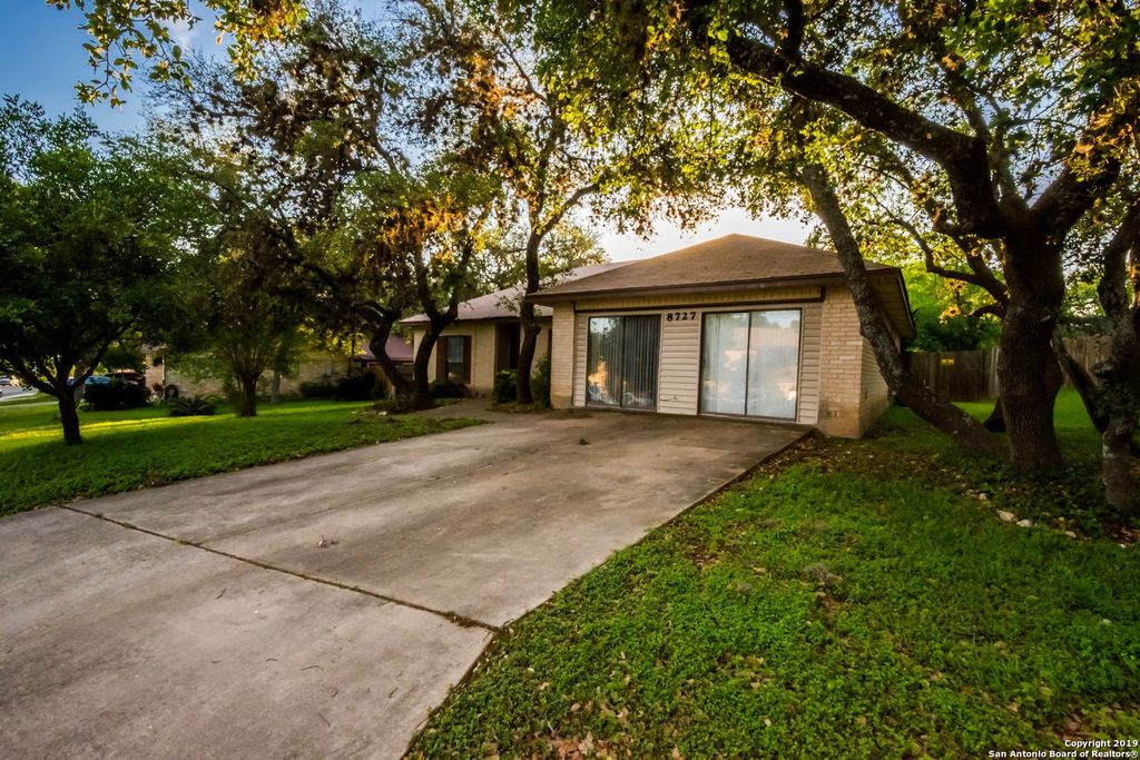 Photo of 8727 timberwilde, San Antonio, TX 78250 (MLS # 1933021)