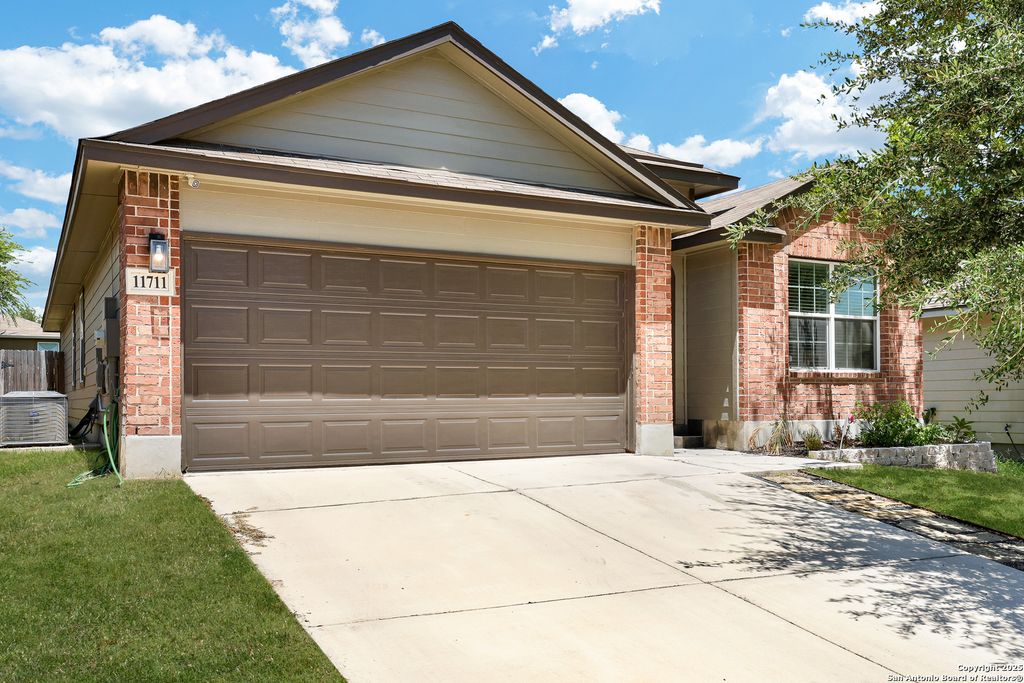 Photo of 11711 Caraway Hill, San Antonio, TX 78245 (MLS # 1926249)