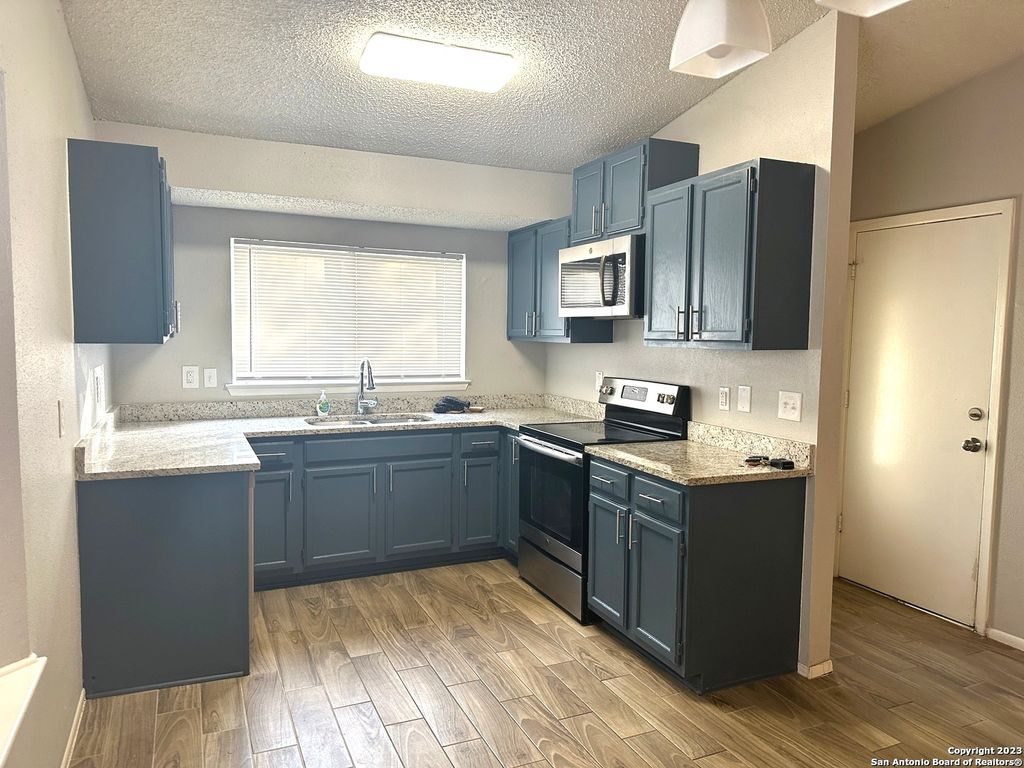 Photo of 10015 Amber Field, San Antonio, TX 78245 (MLS # 1845098)