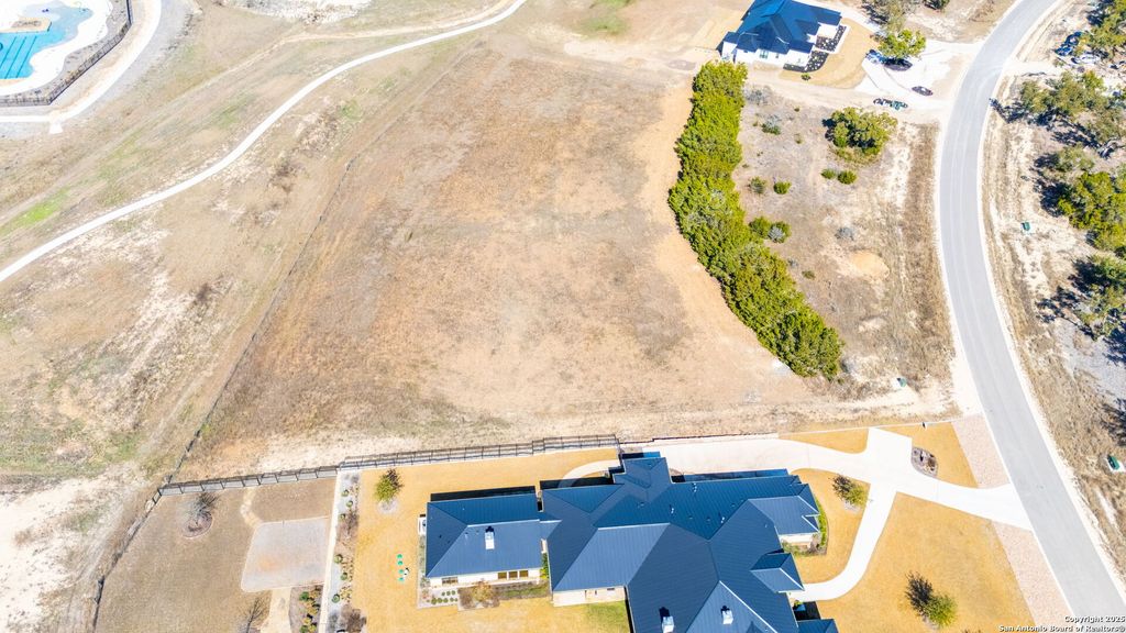 Photo of 34729 CARRIES CREEK DR, Bulverde, TX 78163 (MLS # 1840428)