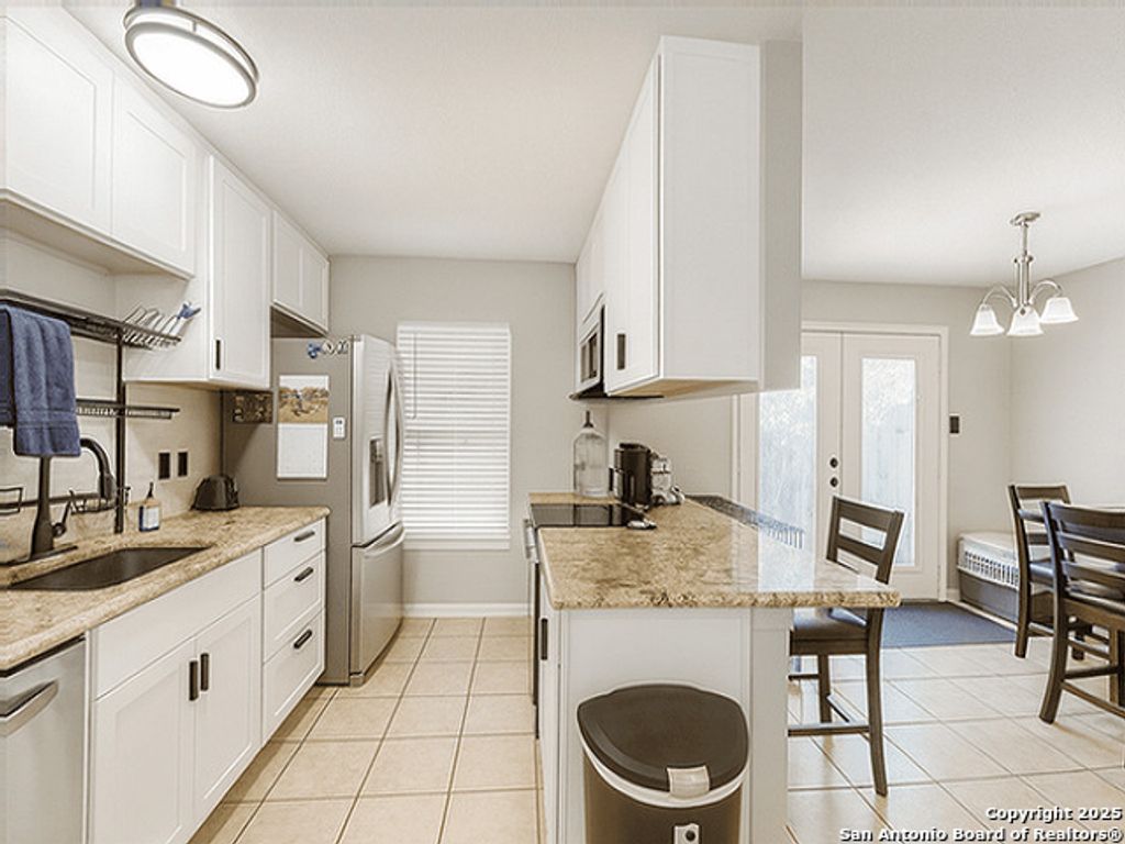 Photo of 9755 Hidden Falls, San Antonio, TX 78250 (MLS # 1917161)