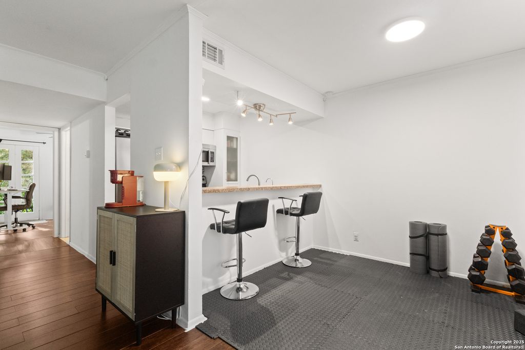 Photo of 8702 Village Dr 103 #103, San Antonio, TX 78217 (MLS # 1915131)