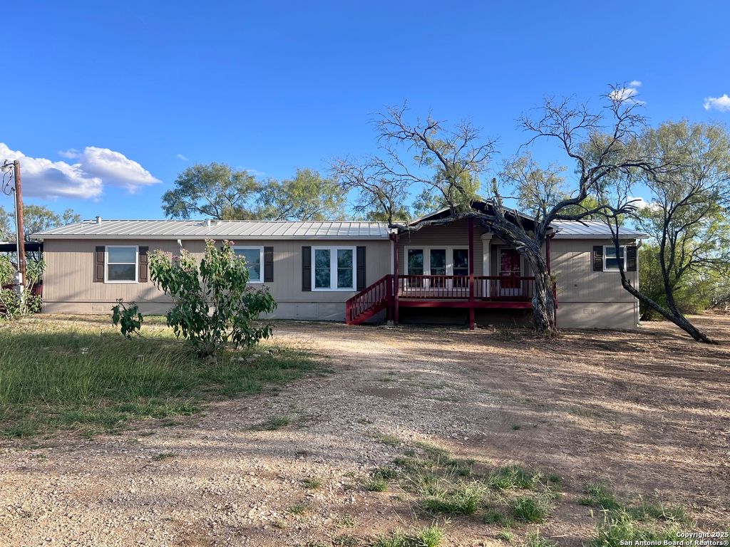 Photo of 445 South Trail, Pleasanton, TX 78064 (MLS # 1912993)