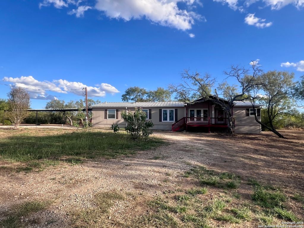 Photo of 445 South Trail, Pleasanton, TX 78064 (MLS # 1912993)