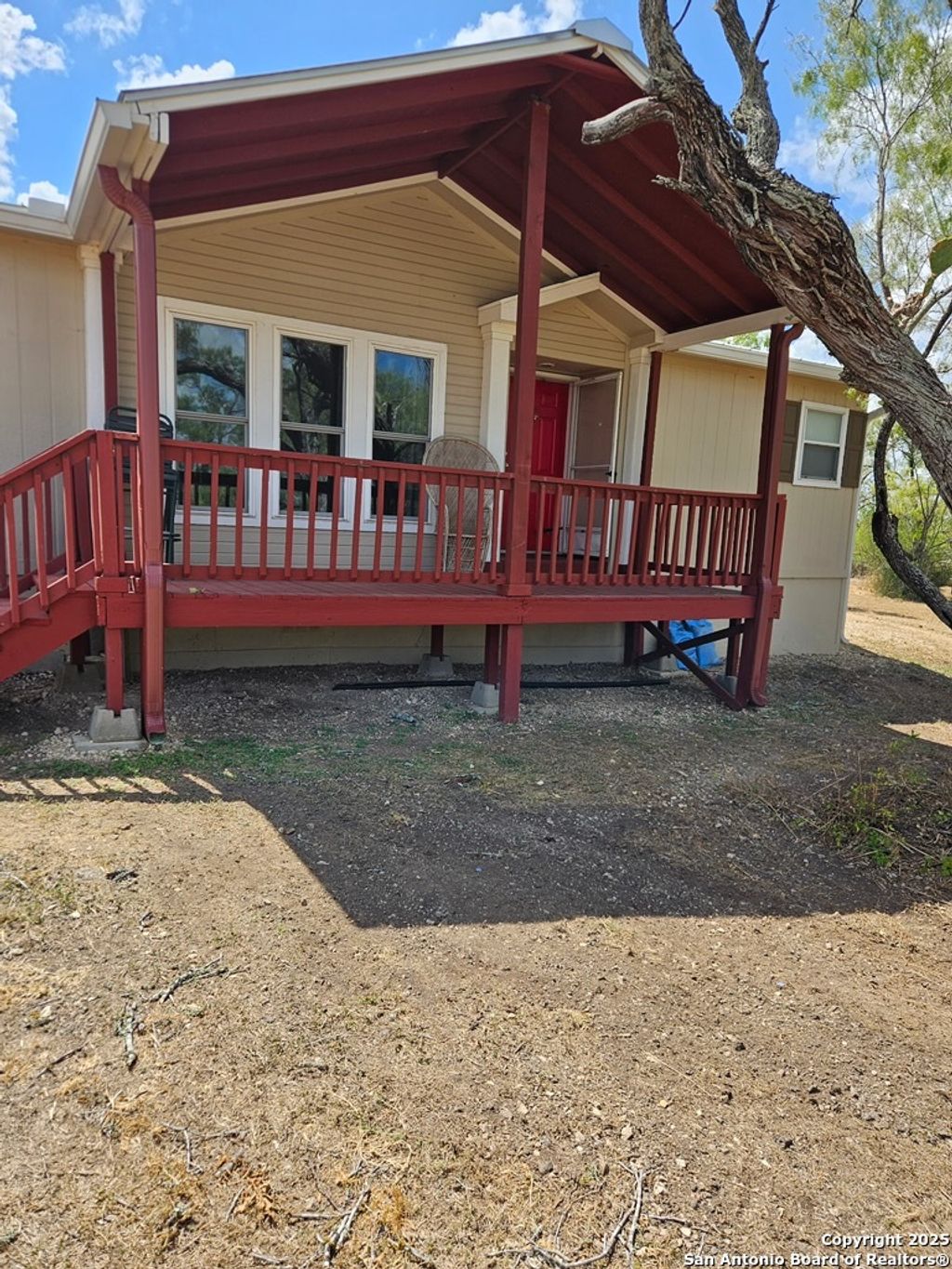 Photo of 445 South Trail, Pleasanton, TX 78064 (MLS # 1912993)