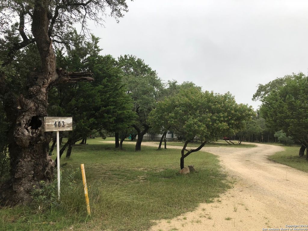Photo of 403 LOS INDIOS RD, Boerne, TX 78006 (MLS # 1945224)