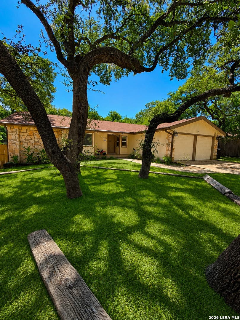 Photo of 5327 TIMBER GLADE ST, San Antonio, TX 78250 (MLS # 2011202)