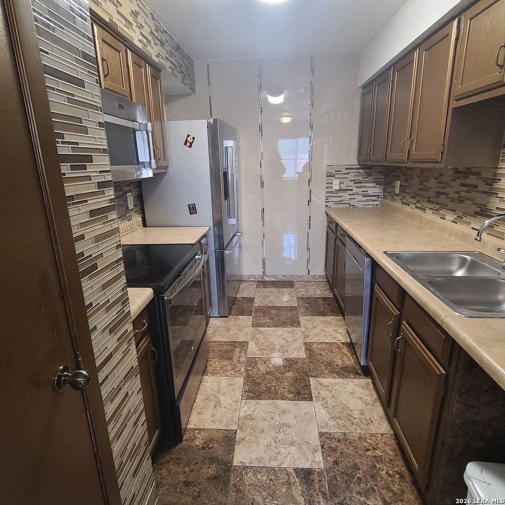 Photo of 12020 Maplerock, San Antonio, TX 78230 (MLS # 1950077)