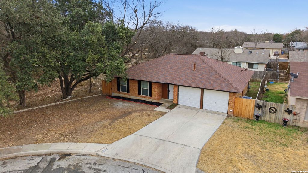 Photo of 8802 Timber Cross, San Antonio, TX 78250 (MLS # 1938854)