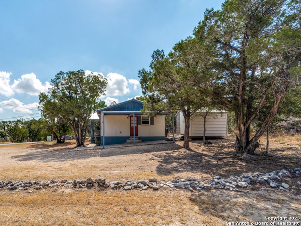 Photo of 1351 SPITZ KEGEL VIEW DR, Canyon Lake, TX 78133 (MLS # 1939164)