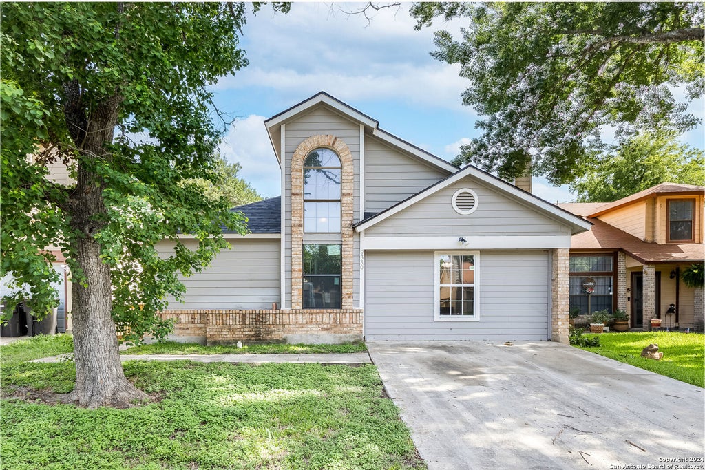 Photo of 9330 Village Lance, San Antonio, TX 78250 (MLS # 1971036)