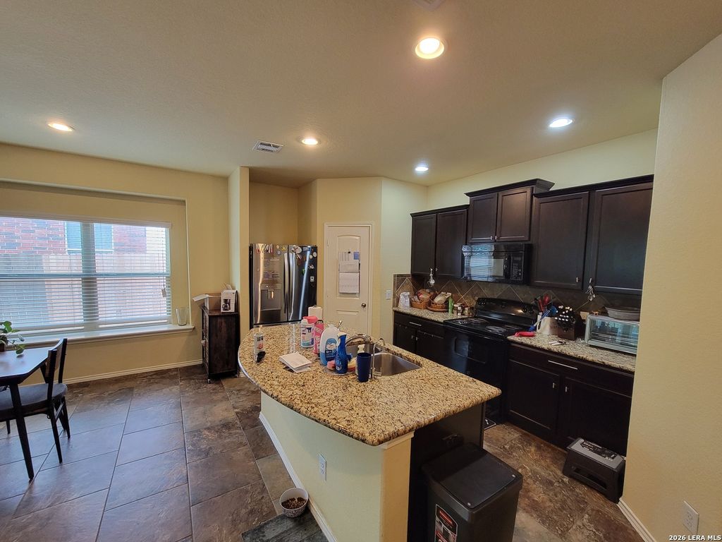 Photo of 9859 MARBACH BND, San Antonio, TX 78245 (MLS # 2002938)