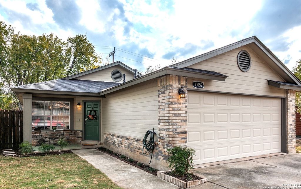 Photo of 10052 Woodtrail, San Antonio, TX 78250 (MLS # 1924552)