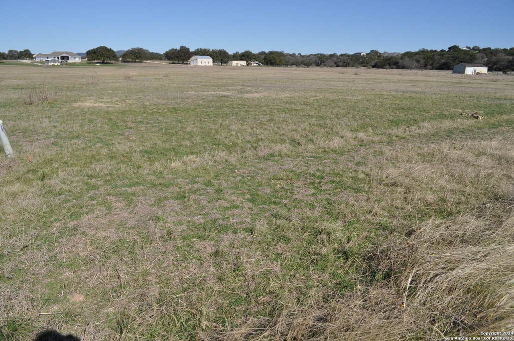 Photo of 307 Hackamore Trl, Bandera, TX 78003 (MLS # 1807055)