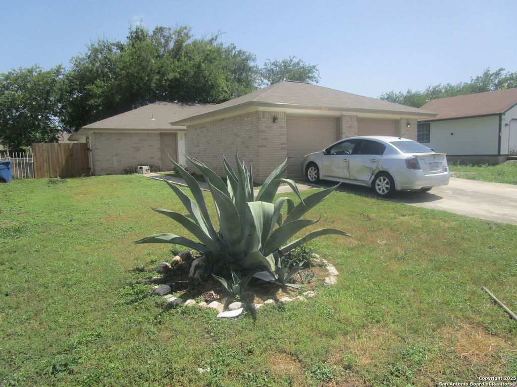 Photo of 8842 Meadow Trace, San Antonio, TX 78250 (MLS # 1937881)