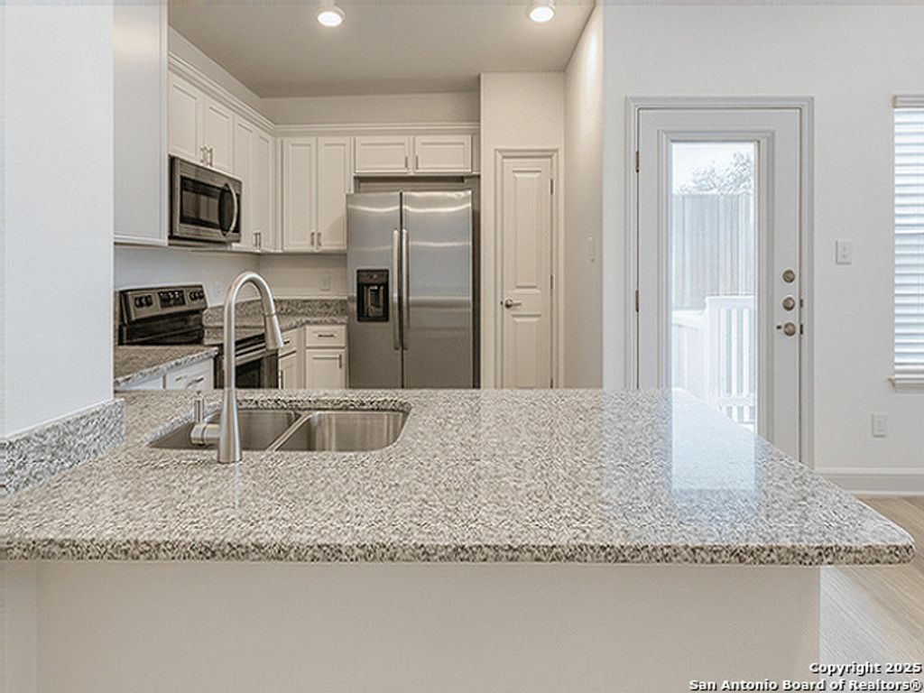 Photo of 7532 Briarwood Pass 102 #102, San Antonio, TX 78252 (MLS # 1914444)