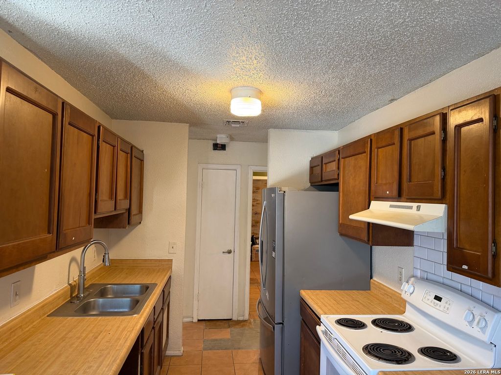 Photo of 9130 KINGS HBR, San Antonio, TX 78242 (MLS # 1957475)