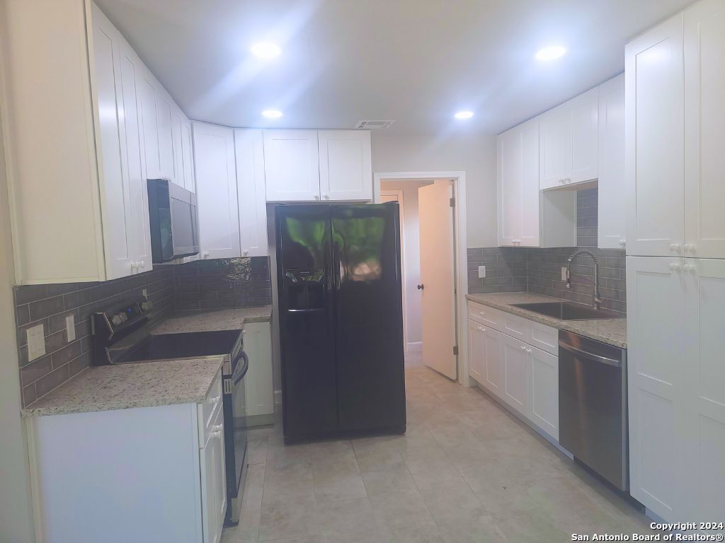 Photo of 8842 THATCH DR, San Antonio, TX 78240 (MLS # 1932861)