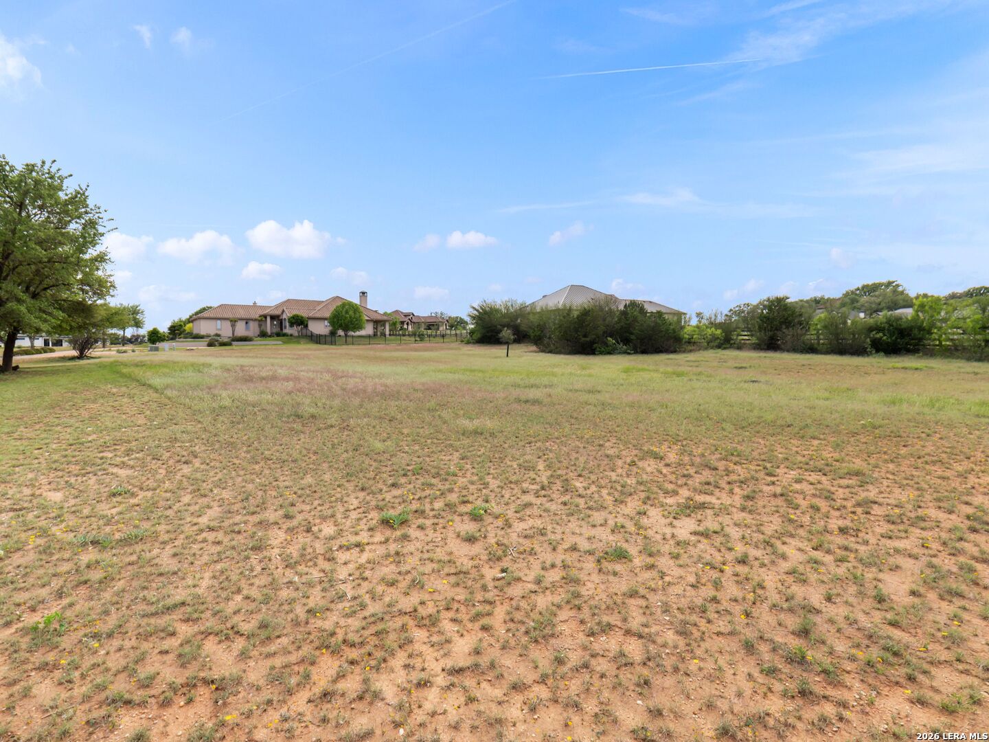 Photo 1 of 16 — 26604 HUNTERS GROVE CT, SPICEWOOD, TX 78669