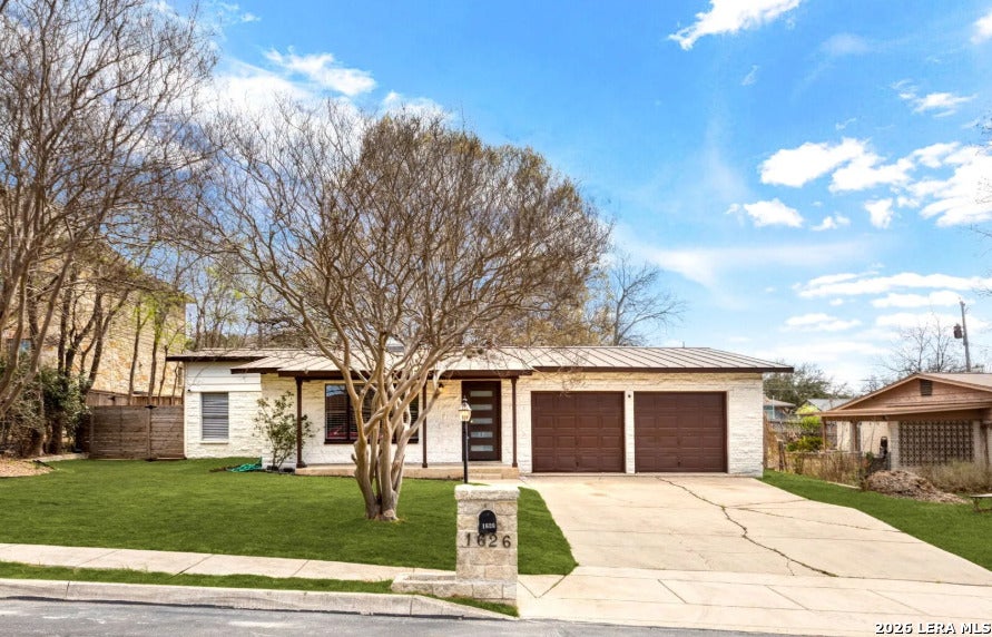 Photo of 1626 W TERRA ALTA DR, San Antonio, TX 78209 (MLS # 2008426)