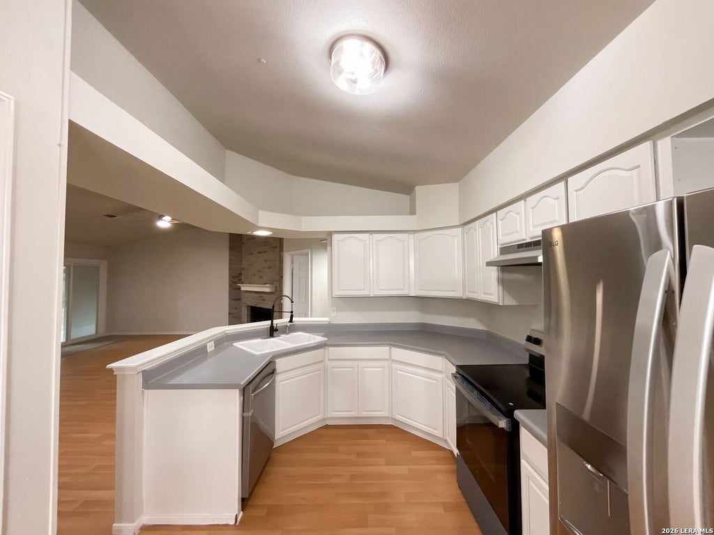 Photo of 9210 GREENS PT, San Antonio, TX 78250 (MLS # 2023888)