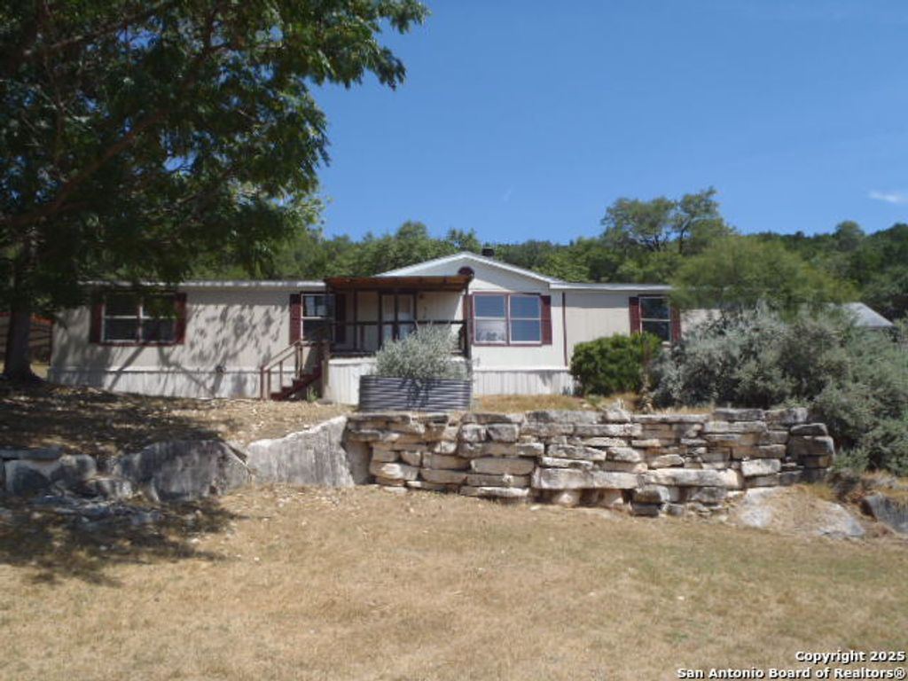 Photo of 410 Duck Mountain Ln, Canyon Lake, TX 78133 (MLS # 1907529)