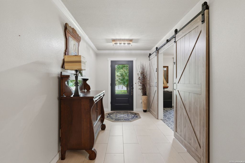 Photo of 302 Whispering Oaks, Adkins, TX 78101 (MLS # 1992489)