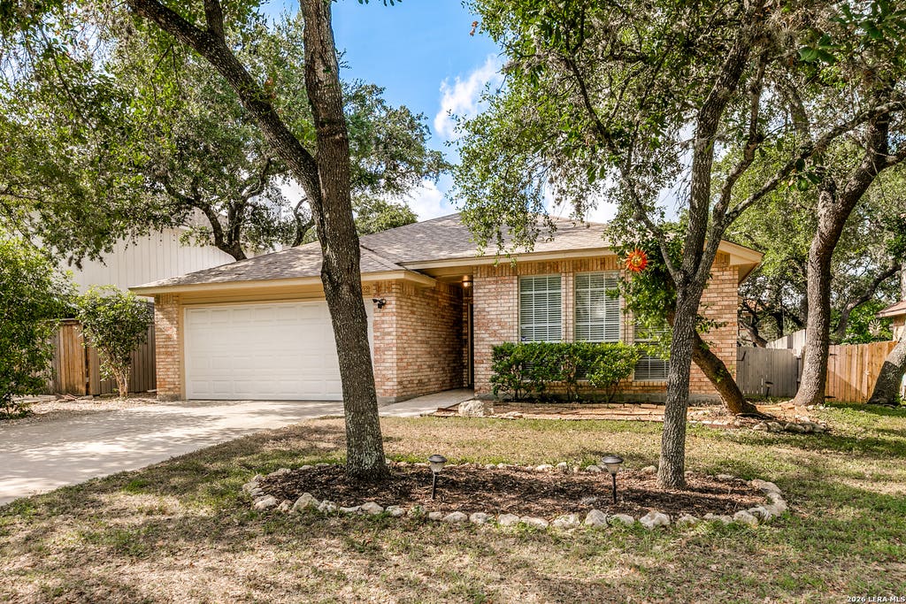 Photo of 8602 TIMBER PL, San Antonio, TX 78250 (MLS # 2007869)