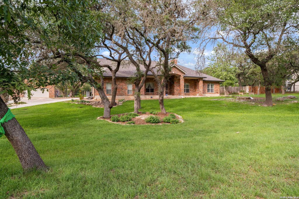 Photo of 8639 RAINTREE WOODS DR, Fair Oaks Ranch, TX 78015 (MLS # 2011456)