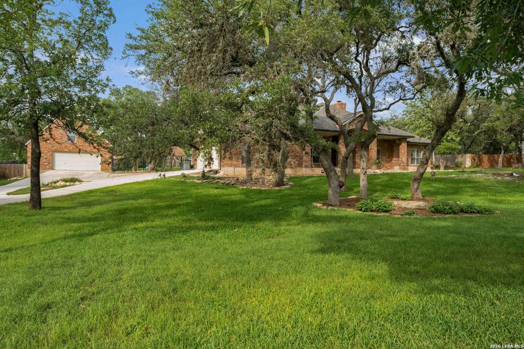 Photo of 8639 RAINTREE WOODS DR, Fair Oaks Ranch, TX 78015 (MLS # 2011456)