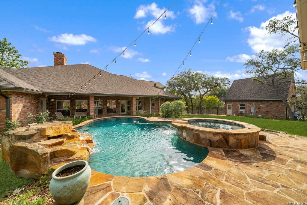 Photo of 8639 RAINTREE WOODS DR, Fair Oaks Ranch, TX 78015 (MLS # 2011456)