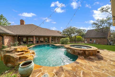 Photo of 8639 RAINTREE WOODS DR, Fair Oaks Ranch, TX 78015 (MLS # 2011456)