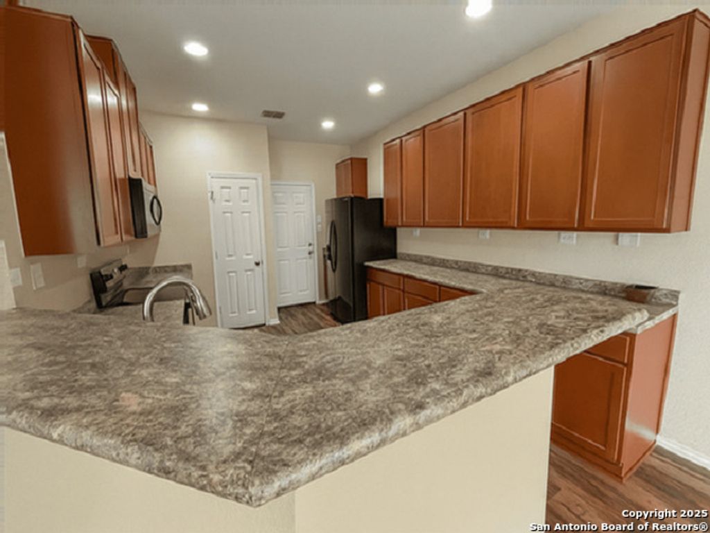 Photo of 9838 Twinbear Creek, San Antonio, TX 78245 (MLS # 1914436)