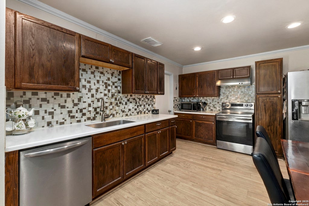 Photo of 6862 FLAMING RIDGE DR, Converse, TX 78109 (MLS # 2007963)