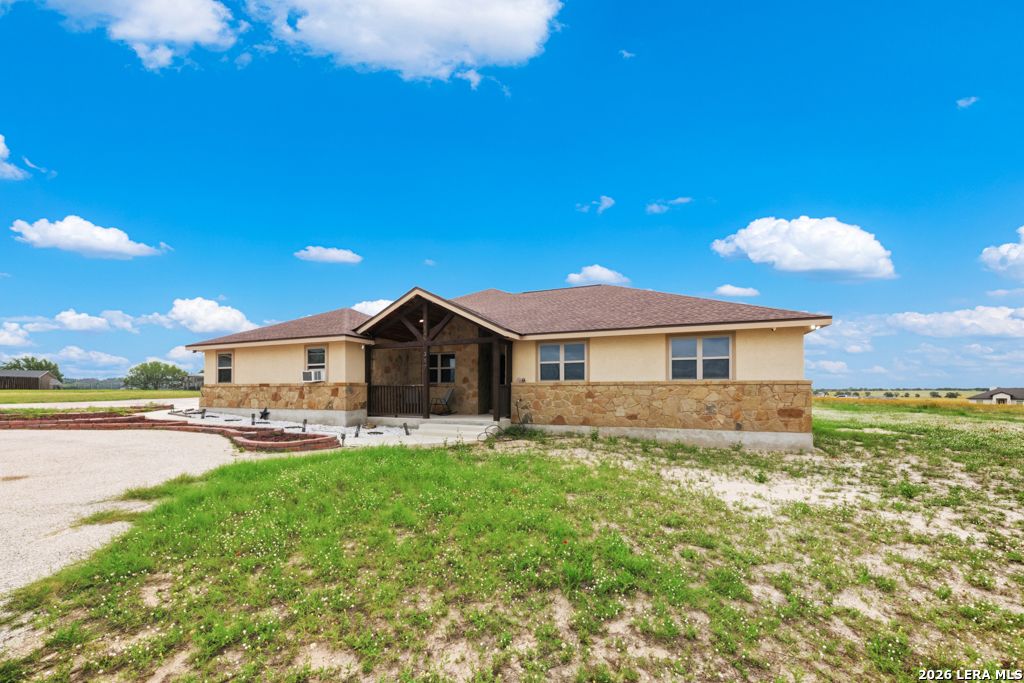 Photo of 317 HONEYSUCKLE LN, La Vernia, TX 78121 (MLS # 1972612)