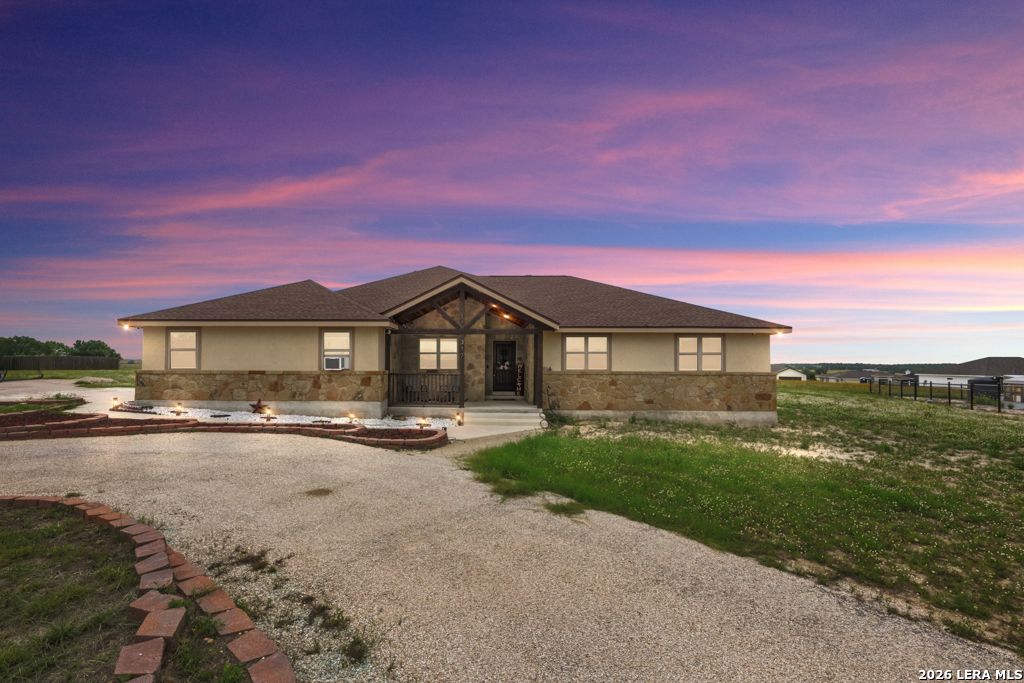 Photo of 317 HONEYSUCKLE LN, La Vernia, TX 78121 (MLS # 1972612)