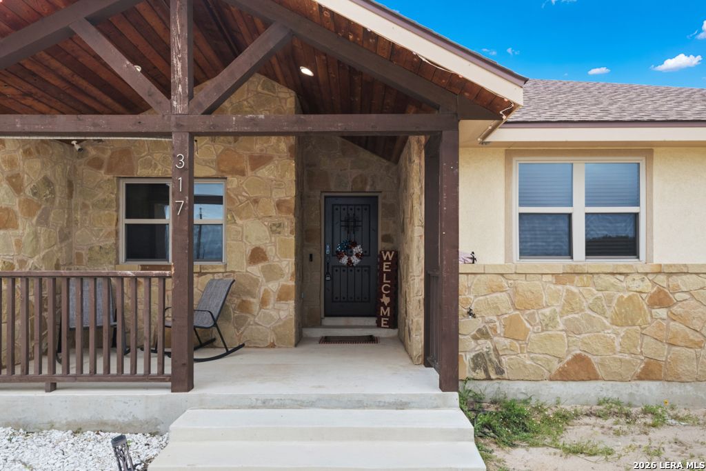 Photo of 317 HONEYSUCKLE LN, La Vernia, TX 78121 (MLS # 1972612)