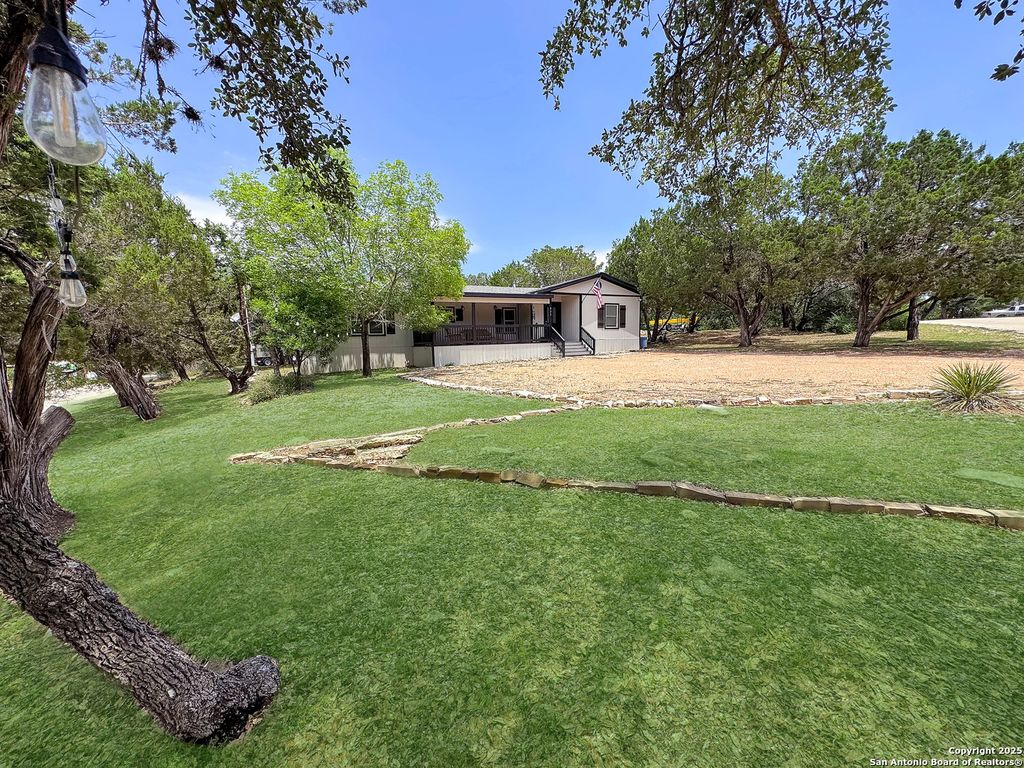 Photo of 823 Trail Crest, Canyon Lake, TX 78133 (MLS # 1871121)