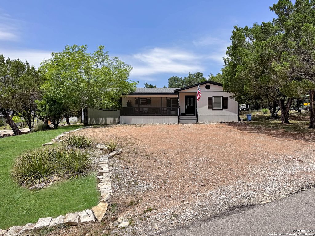 Photo of 823 Trail Crest, Canyon Lake, TX 78133 (MLS # 1871121)